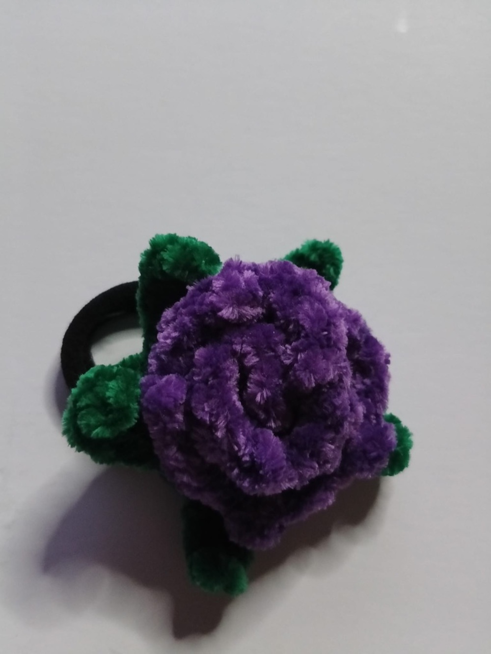Plush Purple Flower Hair Tie with Green Leaves